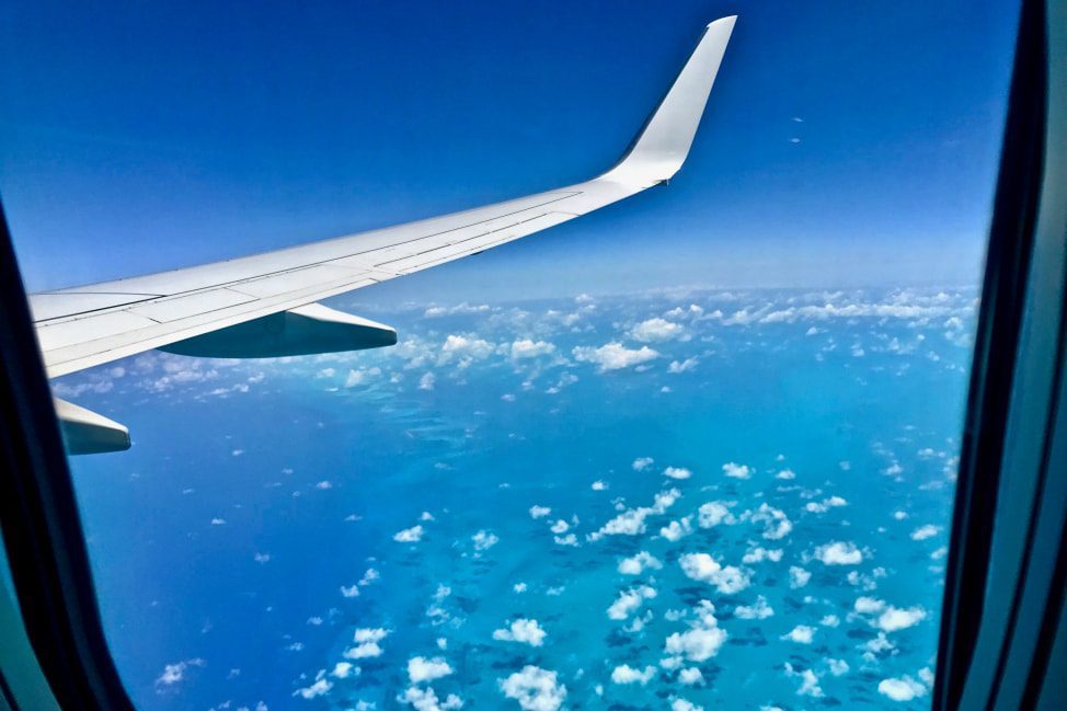 Reflections from the Road - Vol. 35 - Airplane over Caribbean-min